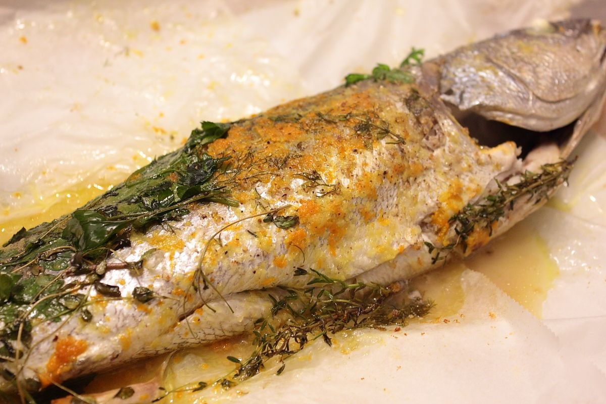 Ombrina di Orbetello al cartoccio agli agrumi ed erbe aromatiche